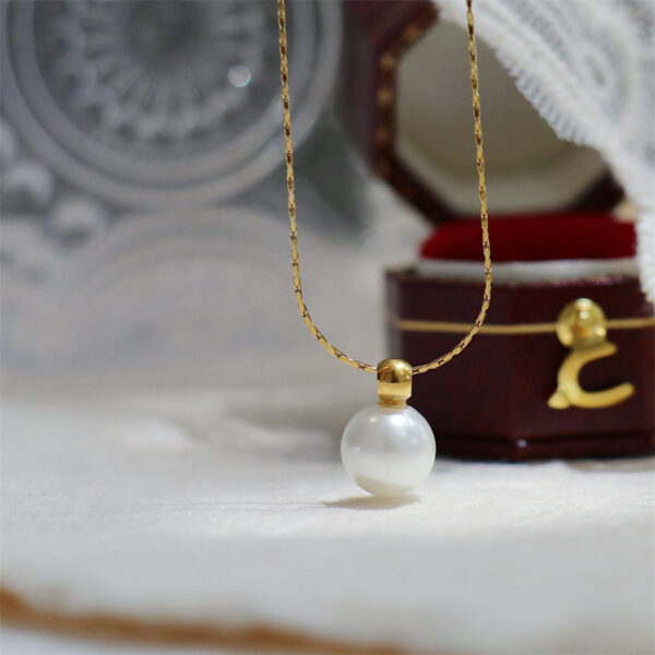 Women's Elegant Round Pendant Necklace – Titanium Steel with Artificial Pearl Inlay